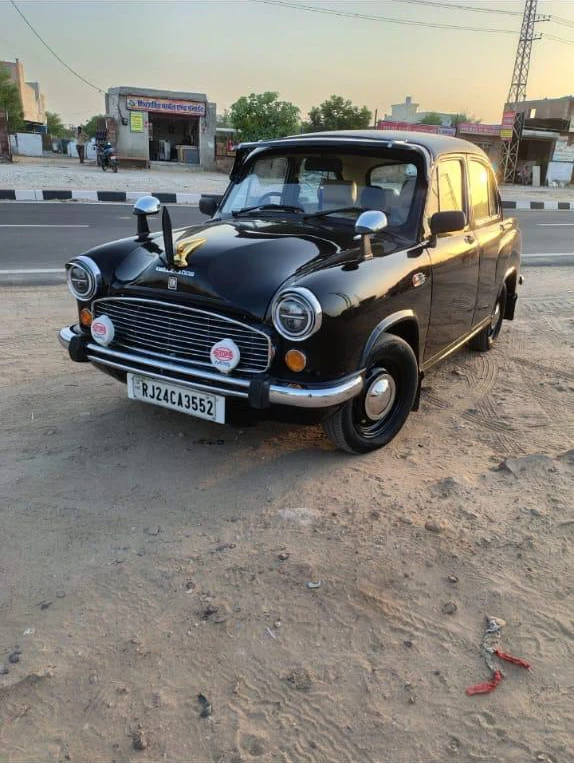 Owner-supplied black HM Ambassador, complete car viewed from the front and side