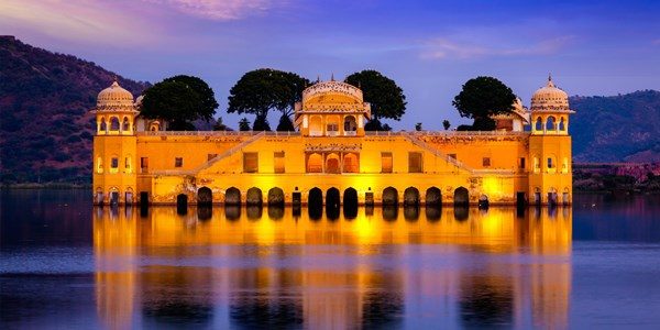 Panorama of Rajasthan landmark - Jal Mahal (Water Palace) on Man Sagar Lake in the evening in twilight.  Jaipur, Rajasthan, India